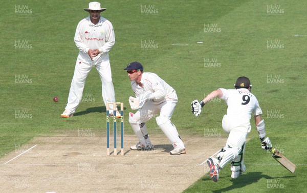 20.04.11 - Glamorgan v Surrey, LV County Championship Div 2 -  Surrey's Steven Davies is run out by Glamorgan's Stewart Walters  