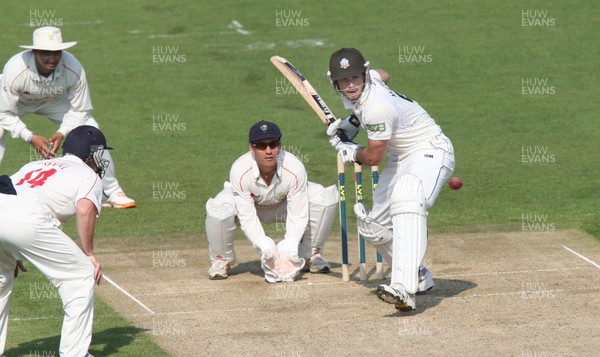 20.04.11 - Glamorgan v Surrey, LV County Championship Div 2 -  Surrey's Tom Maynard plays a shot off the bowling of Glamorgan's Robert Croft 