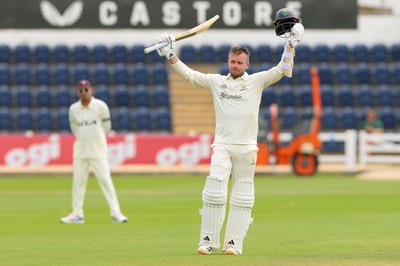 200626 - Glamorgan v Surrey, Rothesay County Championship Division 1- Mason Crane of Glamorgan celebrates as he reaches his 100