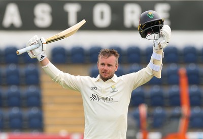 200626 - Glamorgan v Surrey, Rothesay County Championship Division 1- Mason Crane of Glamorgan celebrates as he reaches his 100
