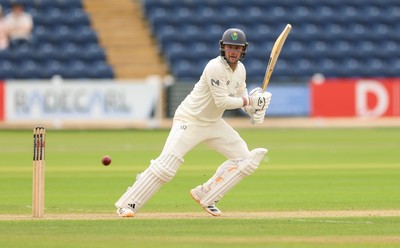 200626 - Glamorgan v Surrey, Rothesay County Championship Division 1- Mason Crane of Glamorgan plays a shot