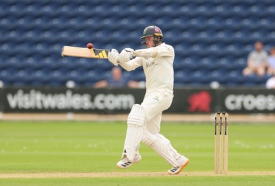 200626 - Glamorgan v Surrey, Rothesay County Championship Division 1- Mason Crane of Glamorgan plays a shot