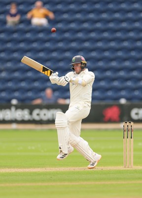 200626 - Glamorgan v Surrey, Rothesay County Championship Division 1- Mason Crane of Glamorgan plays a shot