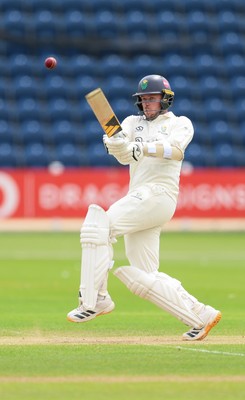 200626 - Glamorgan v Surrey, Rothesay County Championship Division 1- Mason Crane of Glamorgan plays a shot
