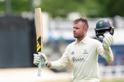200626 - Glamorgan v Surrey, Rothesay County Championship Division 1- Mason Crane of Glamorgan acknowledges his team mates at the supporters as he leaves the field after he is bowled by Dan Lawrence of Surrey for 106