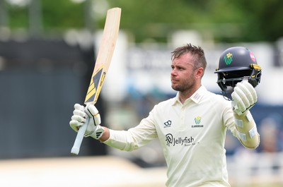 200626 - Glamorgan v Surrey, Rothesay County Championship Division 1- Mason Crane of Glamorgan acknowledges his team mates at the supporters as he leaves the field after he is bowled by Dan Lawrence of Surrey for 106