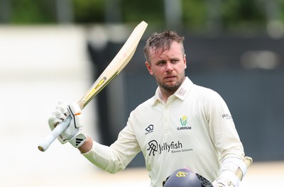 200626 - Glamorgan v Surrey, Rothesay County Championship Division 1- Mason Crane of Glamorgan acknowledges his team mates at the supporters as he leaves the field after he is bowled by Dan Lawrence of Surrey for 106