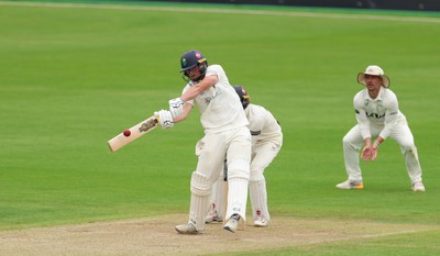 200626 - Glamorgan v Surrey, Rothesay County Championship Division 1- Tom Norton  of Glamorgan hits a four