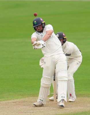 200626 - Glamorgan v Surrey, Rothesay County Championship Division 1- Tom Norton  of Glamorgan hits a four