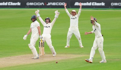 200626 - Glamorgan v Surrey, Rothesay County Championship Division 1- Surrey fielders appeal for the wicket of Tom Norton  of Glamorgan who is give out lbw off Rahul Chahar of Surrey