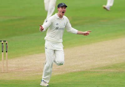 200626 - Glamorgan v Surrey, Rothesay County Championship Division 1- Ben Kellaway of Glamorgan celebrates after he runs out Rory Burns of Surrey