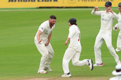 200626 - Glamorgan v Surrey, Rothesay County Championship Division 1- Tom Norton  of Glamorgan celebrates after taking the wicket of Dan Lawrence of Surrey