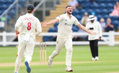 200626 - Glamorgan v Surrey, Rothesay County Championship Division 1- Tom Norton  of Glamorgan celebrates after taking the wicket of Dom Sibley of Surrey