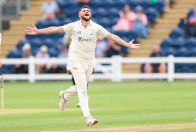 200626 - Glamorgan v Surrey, Rothesay County Championship Division 1- Tom Norton  of Glamorgan celebrates after taking the wicket of Dom Sibley of Surrey