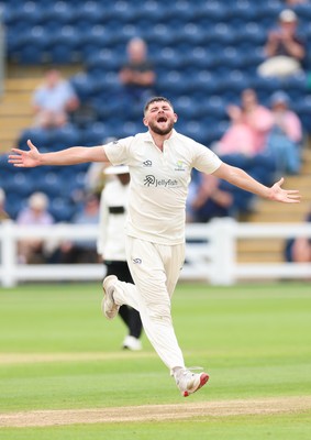 200626 - Glamorgan v Surrey, Rothesay County Championship Division 1- Tom Norton  of Glamorgan celebrates after taking the wicket of Dom Sibley of Surrey
