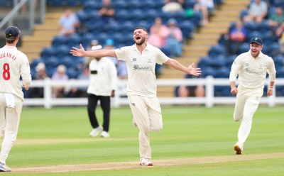 200626 - Glamorgan v Surrey, Rothesay County Championship Division 1- Tom Norton  of Glamorgan celebrates after taking the wicket of Dom Sibley of Surrey