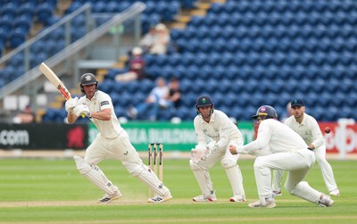 200626 - Glamorgan v Surrey, Rothesay County Championship Division 1- Adam Thomas of Surrey plays a shot
