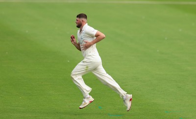 200626 - Glamorgan v Surrey, Rothesay County Championship Division 1- Tom Norton  of Glamorgan bowls