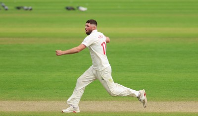 200626 - Glamorgan v Surrey, Rothesay County Championship Division 1- Tom Norton  of Glamorgan bowls