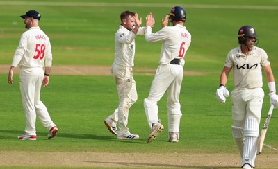 200626 - Glamorgan v Surrey, Rothesay County Championship Division 1- Mason Crane of Glamorgan celebrates after taking the wicket of Sean Abbott of Surrey