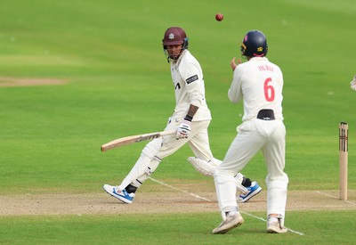 200626 - Glamorgan v Surrey, Rothesay County Championship Division 1- Henry Hurle of Glamorgan catches Rahul Chahar of Surrey