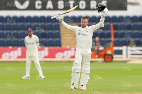 200626 - Glamorgan v Surrey, Rothesay County Championship Division 1- Mason Crane of Glamorgan celebrates as he reaches his 100