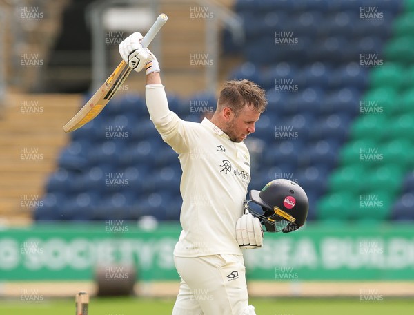 200626 - Glamorgan v Surrey, Rothesay County Championship Division 1- Mason Crane of Glamorgan celebrates as he reaches his 100