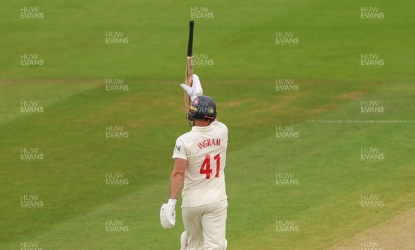 200626 - Glamorgan v Surrey, Rothesay County Championship Division 1- Colin Ingram of Glamorgan celebrates his 50