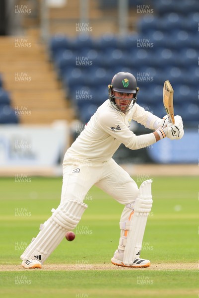 200626 - Glamorgan v Surrey, Rothesay County Championship Division 1- Mason Crane of Glamorgan plays a shot