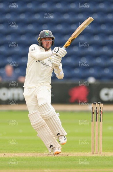 200626 - Glamorgan v Surrey, Rothesay County Championship Division 1- Mason Crane of Glamorgan plays a shot