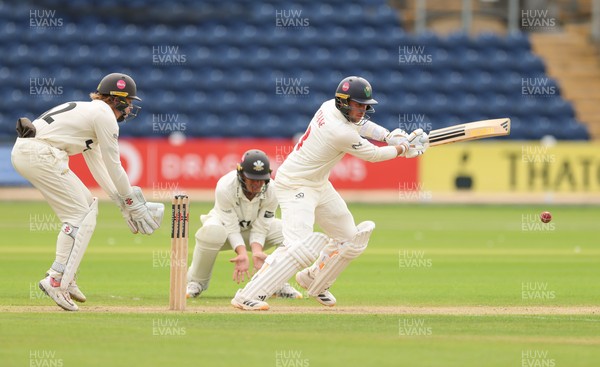 200626 - Glamorgan v Surrey, Rothesay County Championship Division 1- Mason Crane of Glamorgan plays a shot