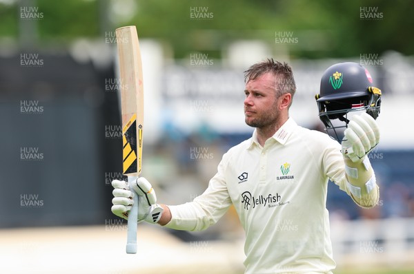 200626 - Glamorgan v Surrey, Rothesay County Championship Division 1- Mason Crane of Glamorgan acknowledges his team mates at the supporters as he leaves the field after he is bowled by Dan Lawrence of Surrey for 106