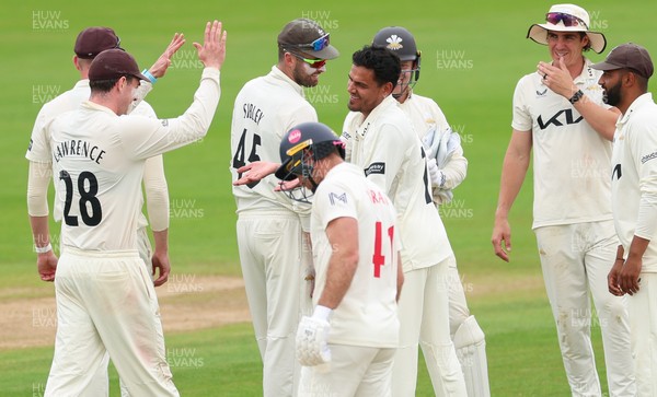200626 - Glamorgan v Surrey, Rothesay County Championship Division 1- Rahul Chahar of Surrey celebrates after taking the wicket of Tom Norton of Glamorgan