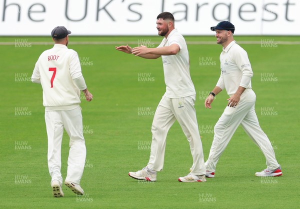 200626 - Glamorgan v Surrey, Rothesay County Championship Division 1- Tom Norton  of Glamorgan celebrates after taking the wicket of Sam Curran of Surrey