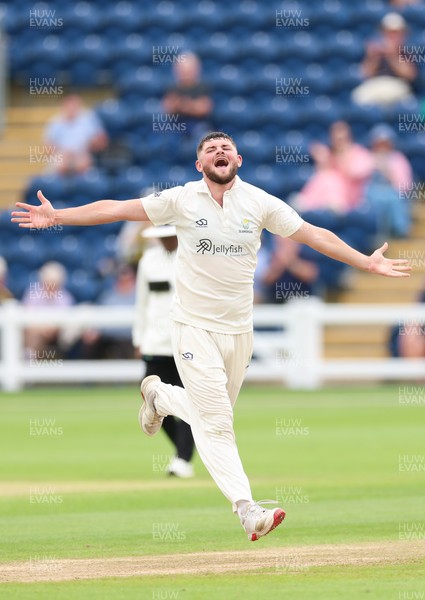 200626 - Glamorgan v Surrey, Rothesay County Championship Division 1- Tom Norton  of Glamorgan celebrates after taking the wicket of Dom Sibley of Surrey
