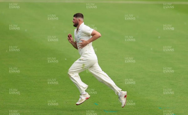 200626 - Glamorgan v Surrey, Rothesay County Championship Division 1- Tom Norton  of Glamorgan bowls
