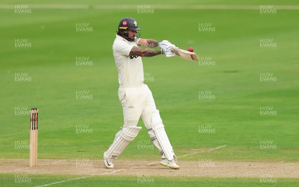 200626 - Glamorgan v Surrey, Rothesay County Championship Division 1- Jordan Clark of Surrey plays a shot