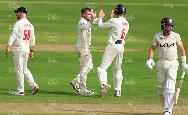 200626 - Glamorgan v Surrey, Rothesay County Championship Division 1- Mason Crane of Glamorgan celebrates after taking the wicket of Sean Abbott of Surrey