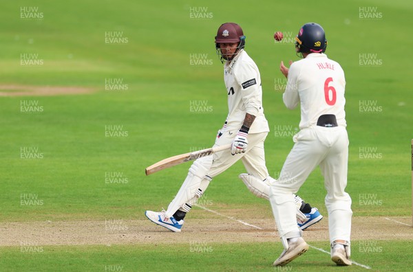 200626 - Glamorgan v Surrey, Rothesay County Championship Division 1- Henry Hurle of Glamorgan catches Rahul Chahar of Surrey