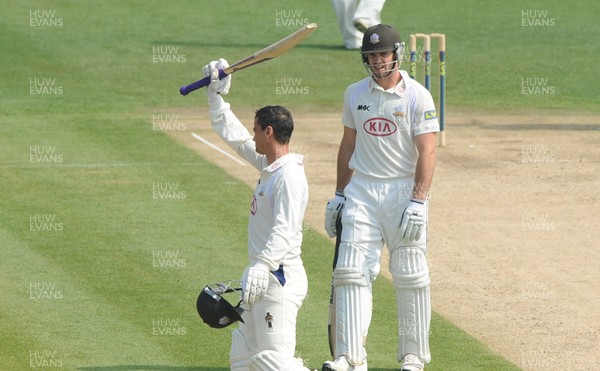 21.04.11 - Glamorgan v Surrey - LV County Championship Division 2 - Zander de Bruyn of Surrey celebrates reaching 150 runs as Tom Maynard looks on. 