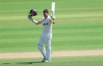 210626 - Glamorgan v Surrey, Rothesay County Championship Division 1- Rory Burns of Surrey celebrates his 100