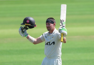 210626 - Glamorgan v Surrey, Rothesay County Championship Division 1- Rory Burns of Surrey celebrates his 100
