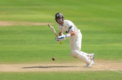 210626 - Glamorgan v Surrey, Rothesay County Championship Division 1- Ollie Pope of Surrey plays a shot