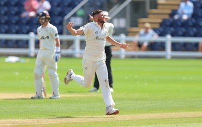 210626 - Glamorgan v Surrey, Rothesay County Championship Division 1- Tom Norton  of Glamorgan celebrates as he takes the wicket of Rory Burns of Surrey