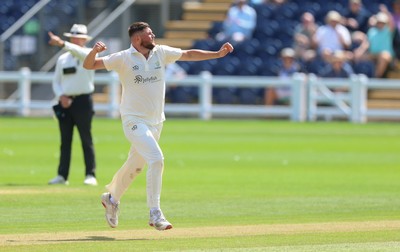 210626 - Glamorgan v Surrey, Rothesay County Championship Division 1- Tom Norton  of Glamorgan celebrates as he takes the wicket of Rory Burns of Surrey