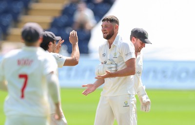 210626 - Glamorgan v Surrey, Rothesay County Championship Division 1- Tom Norton  of Glamorgan celebrates as he takes the wicket of Rory Burns of Surrey