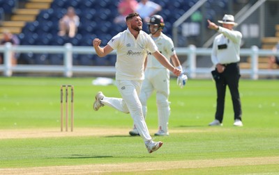 210626 - Glamorgan v Surrey, Rothesay County Championship Division 1- Tom Norton  of Glamorgan celebrates as he takes the wicket of Rory Burns of Surrey