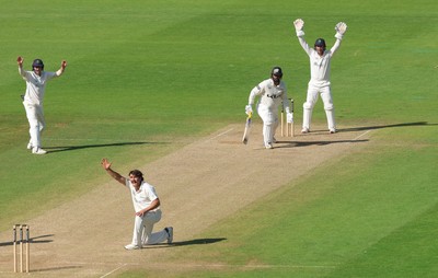 210626 - Glamorgan v Surrey, Rothesay County Championship Division 1- Kiran Carlson of Glamorgan makes on appeal for the wicket of Ryan Patel of Surrey