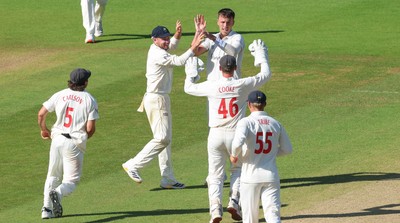 210626 - Glamorgan v Surrey, Rothesay County Championship Division 1- Ryan Hadley of Glamorgan celebrates after taking the wicket of Ryan Patel of Surrey