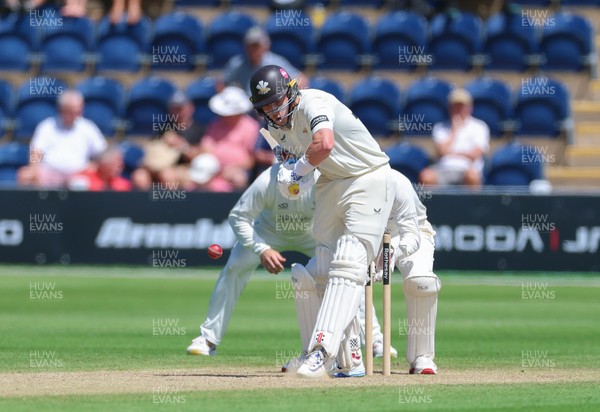 210626 - Glamorgan v Surrey, Rothesay County Championship Division 1- Ollie Pope of Surrey plays a shot